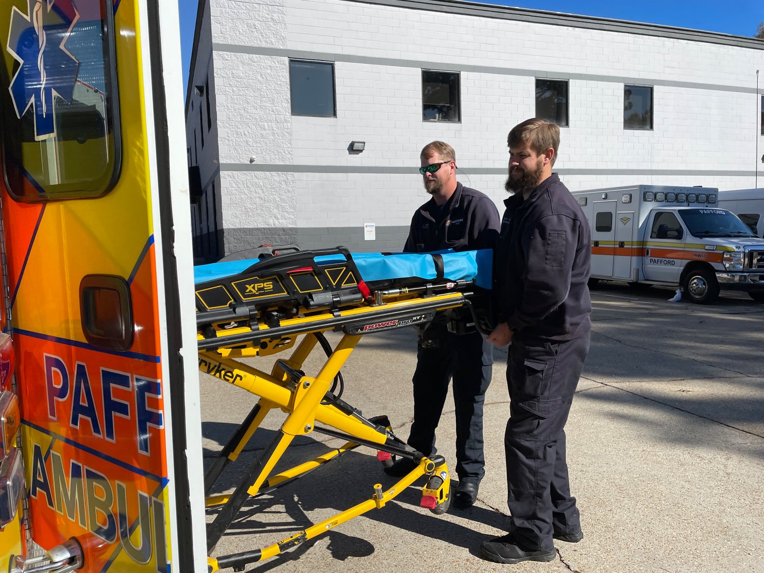 Pafford EMS Logistics Manager and Advanced EMT Chris Bain and Operation Manager and Paramedic Curtis Weldon prepare to go on a call. Ambulance providers throughout the state have been impacted by COVID-19.